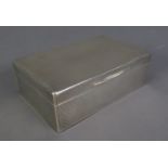 GEORGE V SILVER TABLE CIGARETTE BOX, oblong with all-over engine turned decoration, good tight
