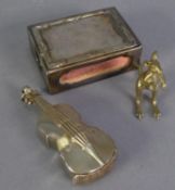 THREE PIECES OF ELECTROPLATE, comprising: CELLO PATTERN VESTA CASE, MATCHBOX HOLDER and a MODEL OF A