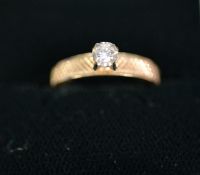 14k GOLD LADY'S ENGAGEMENT RING claw -set with a single small brilliant-cut diamond, 3.0gms gross