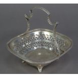 GEORGE V PIERCED SILVER CAKE BASKET BY MARTIN HALL & Co, of rounded oblong form with pierced