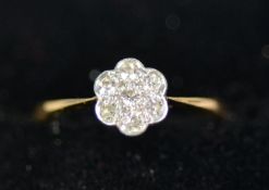 18CT GOLD TINY DIAMOND SET FLORET RING