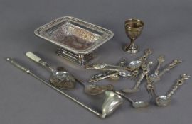 ELEVEN SILVER COLOURED AND WHITE METAL SOUVENIR SPOONS AND CONDIMENT CUTLERY, together with an