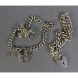 TWO SILVER CURB PATTERN CHAIN BRACELETS, with padlock clasps, one also with a silver charm in the