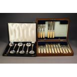 WALNUT CASED PART SET OF NINE ELECTROPLATED FISH KNIVES AND FORKS BY WALKER & HALL, with engraved