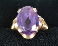 14CT GOLD DRESS RING, with a dark blye oval quartz, in a four claw setting, 8 gms, ring size L/M