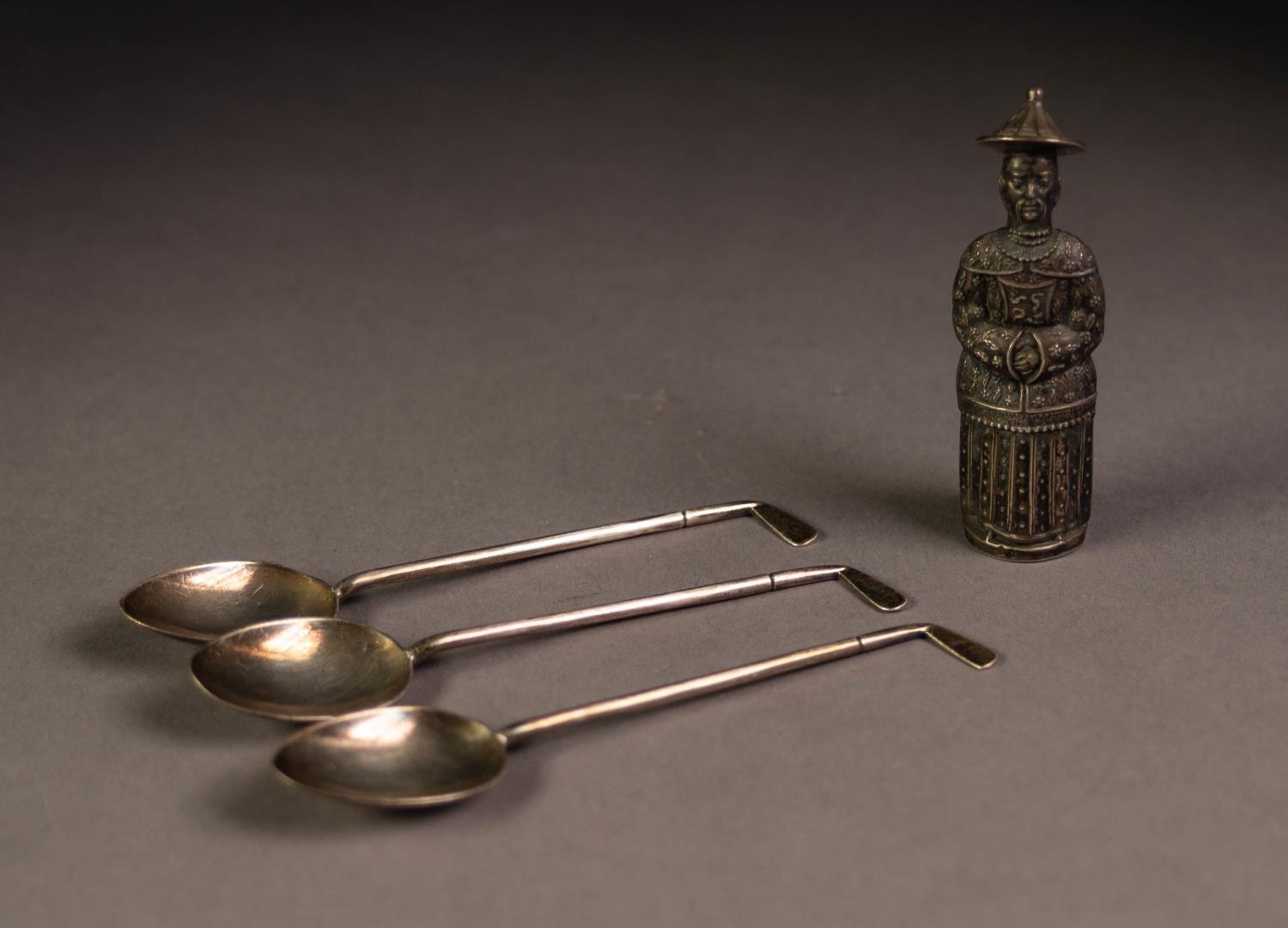 CHINESE EMBOSSED SILVER COLOURED METAL FIGURAL NEEDLE CASE, modelled as a finely dressed member of