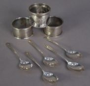 THREE SILVER NAPKIN RINGS, including two engine turned examples, together with a SET OF FIVE
