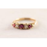 EDWARDIAN 18ct GOLD, RUBY AND DIAMOND RING with a chased scroll sided claw setting of two old cut