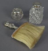 EDWARD VII CRUMB BRUSH WITH EMBOSSED FILLED SILVER HANDLE, together with TWO TOILET JARS WITH SILVER