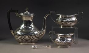 THREE PIECE ELECTROPLATED TEA SET, of part fluted, rounded oblong form with black angular scroll
