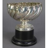 LATE VICTORIAN EMBOSSED SILVER ROSE BOWL, of wrythen fluted form with vacant C scroll cartouche,