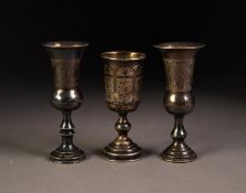 TWO ENGRAVED SILVER SMALL WINE GOBLETS, together with a SIMILAR, FOREIGN SILVER EXAMPLE, 4? (10.2cm)