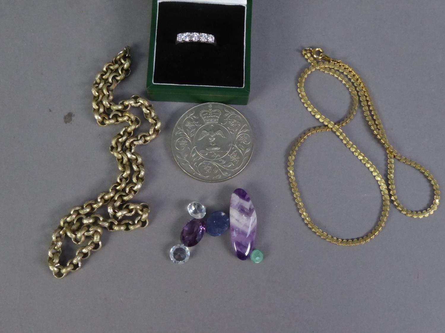 SIX LOOSE STONES; two metal chain NECKLACES; a paste set five stone RING and a 1977 CROWN COIN (10)