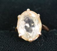 9ct GOLD RING set with a pale oval citrine, 4.3 gms, ring size J/K