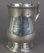 EDWARD II GEORGIAN STYLE SILVER PRESENTATION PINT TANKARD, of footed baluster form with acanthus
