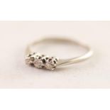 18ct WHITE GOLD AND PLATINUM RING, claw set with three small old cut diamonds, approximately .17ct