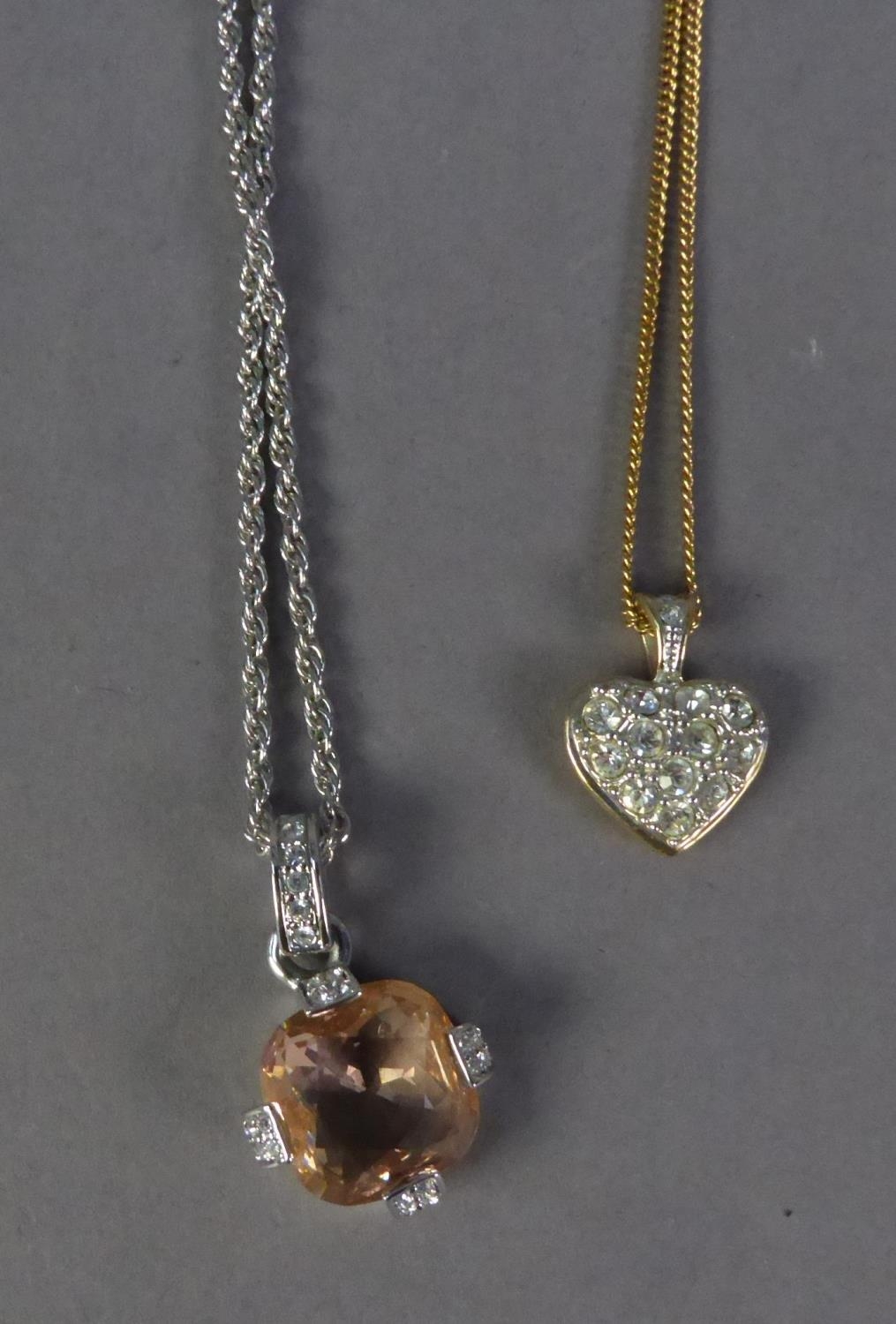 SWAROVSKI BRIGHT METAL FINE CHAIN NECKLACE AND PENDANT set with yellow crystal stone and tiny