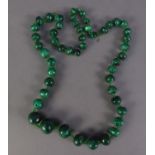 CONTINUOUS SINGLE STRAND OF GRADUATED ROUND MALACHITE BEADS, with glass micro bead separators