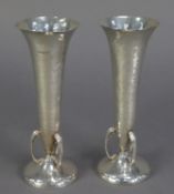 GEORGE V PAIR OF PLANISHED AND WEIGHTED SILVER ARTS AND CRAFTS TRUMPET VASES BY WALKER & HALL,