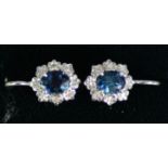 PAIR OF WHITE GOLD (unmarked) SAPPHIRE AND DIAMOND EARRINGS for pierced ears, each set with an