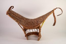 CHILD?S WOVEN WICKER BASKET SADDLE, with brown leather fittings