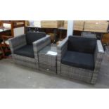 A PAIR OF SIMILAR RECTANGULAR ARMCHAIRS WITH A SMALL COFFEE TABLE