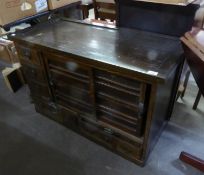 A CHINESE STAINED HARDWOOD CABINET, WITH CUPBOARD WITH TWO SLIDING DOORS, THREE SHORT AND TWO LONGER