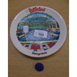 A BUTLINLAND - SKEGNESS PLATE AND A BUTLINS BEAVERS CUB ENAMEL BADGE (2)