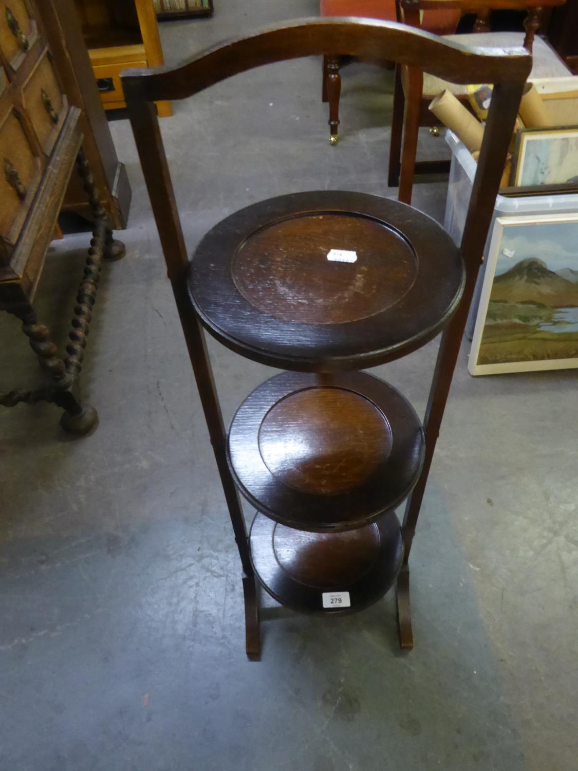 AN OAK THREE-TIER CAKE STAND