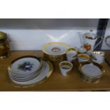 A COMPOSITE 29 PIECE BAVARIAN AND CZECHOSLOVAKIAN GOLD BORDERED AND FRUIT PRINTED TEA SERVICE