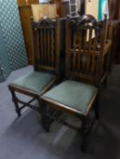 A PAIR OF OAK RAIL BACK DINING CHAIRS, OF JACOBEAN STYLE