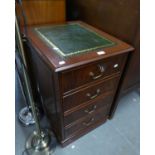 A REPRODUCTION MAHOGANY FILING CABINET, HAVING TWO FILING DRAWERS WITH GREEN LEATHER INSET TOP