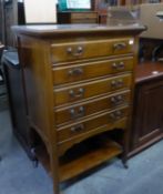 A MAHOGANY MUSIC CABINET WITH FALL-FRONT DRAWERS