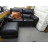 A MODERN BLACK HIDE TWO SEATER SETTEE WITH SADDLE ARMS AND A MATCHING LOUNGE ARMCHAIR (2)