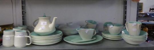 POOLE POTTERY DINNER AND TEA SERVICE, WITH PALE BLUE INTERIOR, PALE GREY EXTERIOR