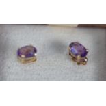 PAIR OF .375 STAMPED GOLD AMETHYST SET EARRINGS