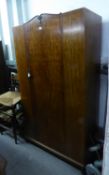 A MAHOGANY SINGLE DOOR HANG WARDROBE, ON BRACKET FEET, 3'6" WIDE