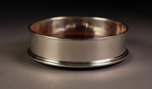 MILLENNIUM HALLMARKED SILVER BOTTLE COASTER, with turned mahogany base, 5? (12.7cm) diameter, boxed