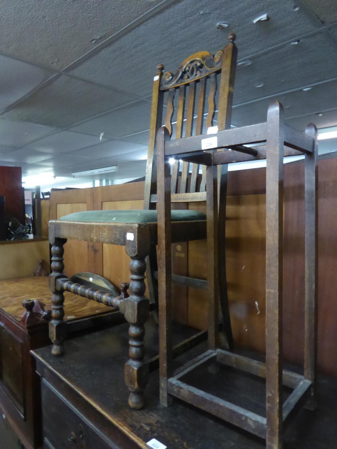 AN OAK RECTANGULAR STICK STAND AND A JACOBEAN STYLE OAK RAIL BACKED DINING CHAIR (2)