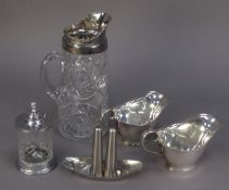 CUT GLASS WATER JUG WITH ELECTROPLATED COLLAR, of tapering form with raised scroll border to the