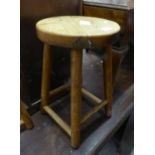 A PITCH PINE CIRCULAR KITCHEN STOOL