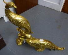 A PAIR OF MODERN GILT COMPOSITION HEARTH ORNAMENTS, IN THE FORM OF EXOTIC BIRDS