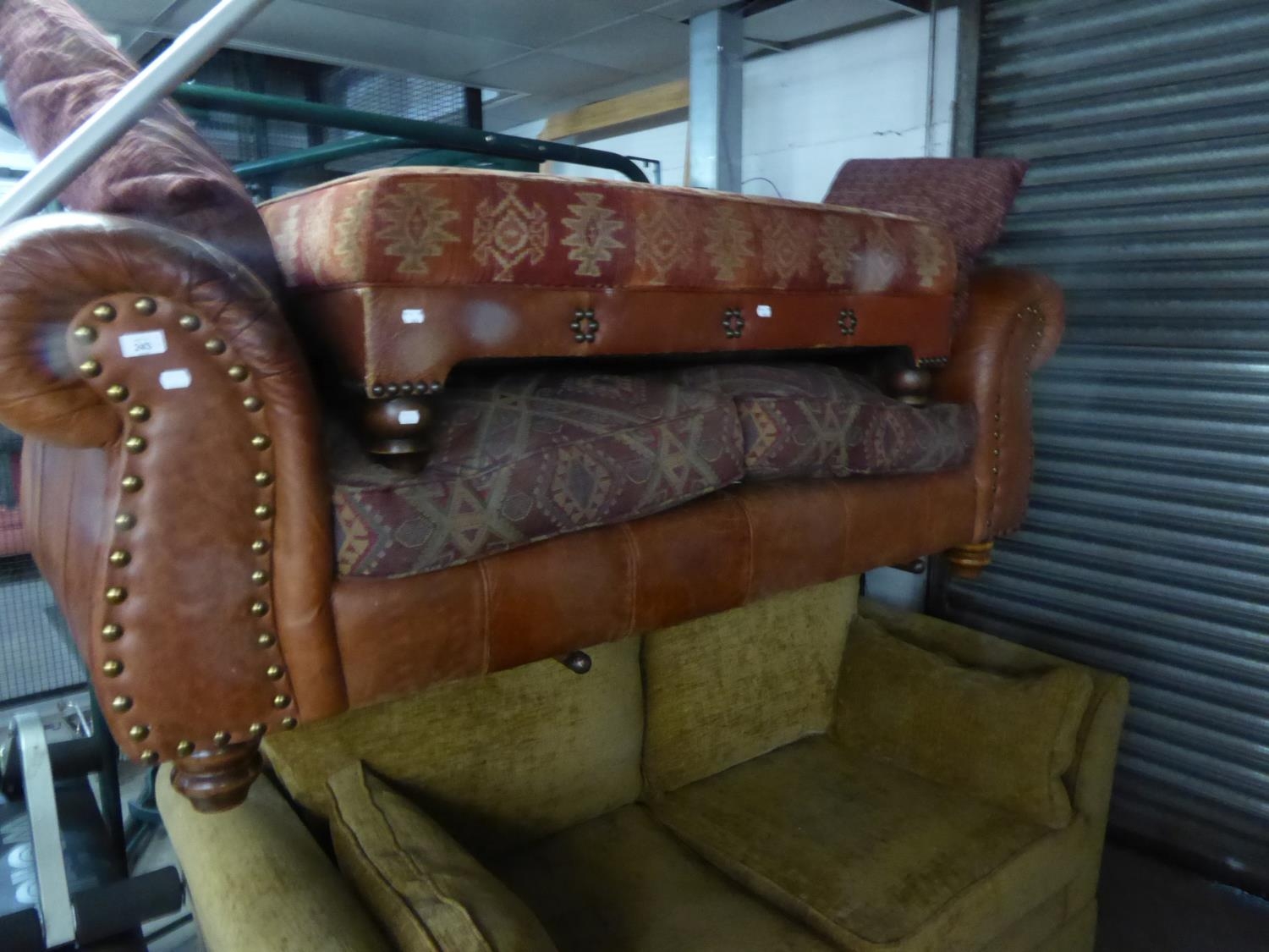 A THOMAS LLOYD BROWN LEATHER UPHOLSTERED SOFA OF GENEROUS PROPORTIONS, BRASS STUDDED, WITH TWO LOOSE - Image 2 of 2