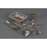 ELEVEN SILVER COLOURED AND WHITE METAL SOUVENIR SPOONS AND CONDIMENT CUTLERY, together with an