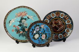 JAPANESE MEIJI PERIOD CLOISONNE WALL PLAQUE, the centre with two red crested cranes in flight