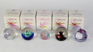 FIVE BOXED CAITHNESS SCOTLAND STUDIO GLASS PAPERWEIGHTS, in multicolour abstract pattern boxes,