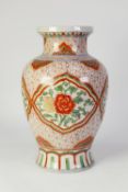 MODERN ORIENTAL PORCELAIN VASE, of ovoid form with short, waisted neck, painted in tones of red,