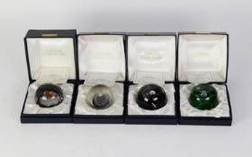 FOUR BOXED CAITHNESS SCOTLAND STUDIO GLASS PAPERWEIGHTS, each in hinge top fitted box with