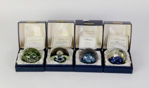 FOUR BOXED CAITHNESS SCOTLAND STUDIO GLASS PAPERWEIGHTS, each in hinge top fitted box with