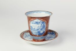 JAPANESE MEIJI PERIOD EGGSHELL PORCELAIN TALL CUP ON SAUCER STAND, each painted in underglaze blue